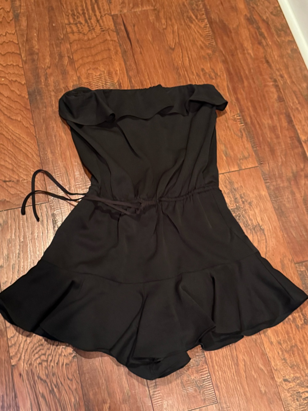 NWT Glam Black Strapless Ruffle Romper